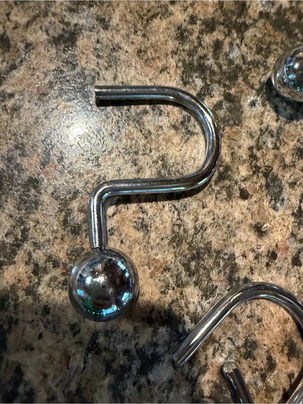 Shower curtain hangers